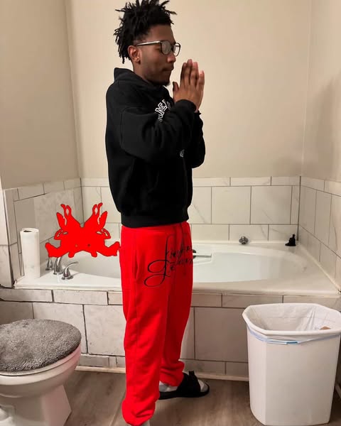 red "love yourself" sweatpants